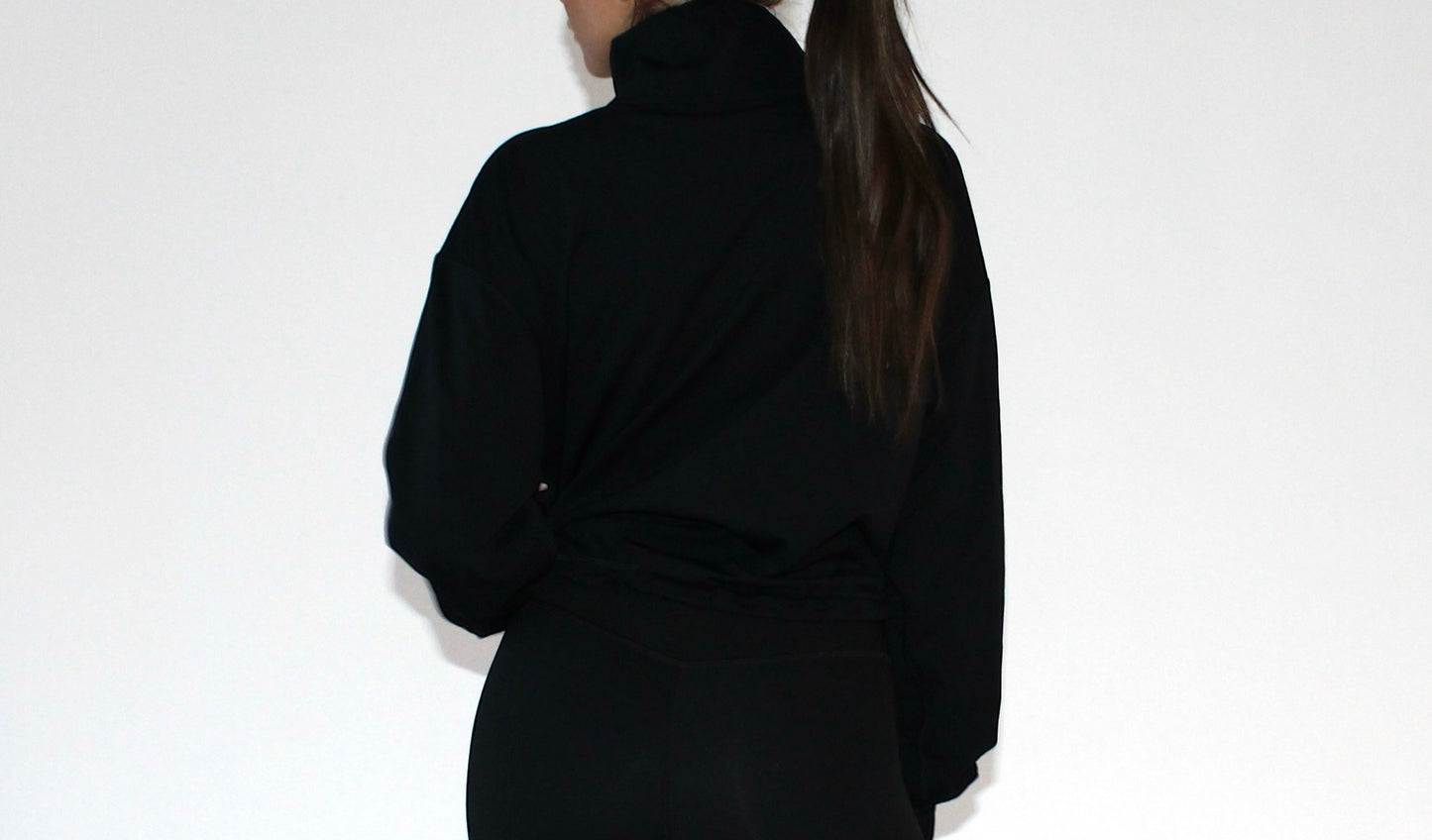 Glow half zipped jacket in black